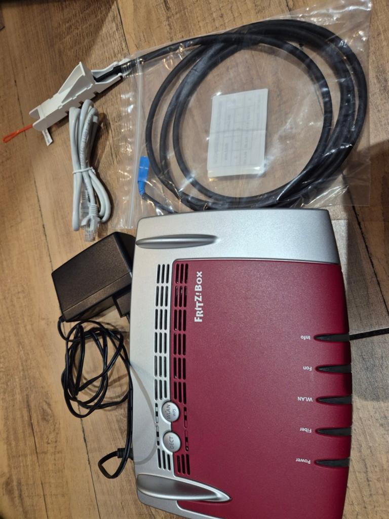 Fritzbox 5490 glasvezel modem, Ophalen of Verzenden, Zo goed als nieuw, Router met modem, Fritzbox