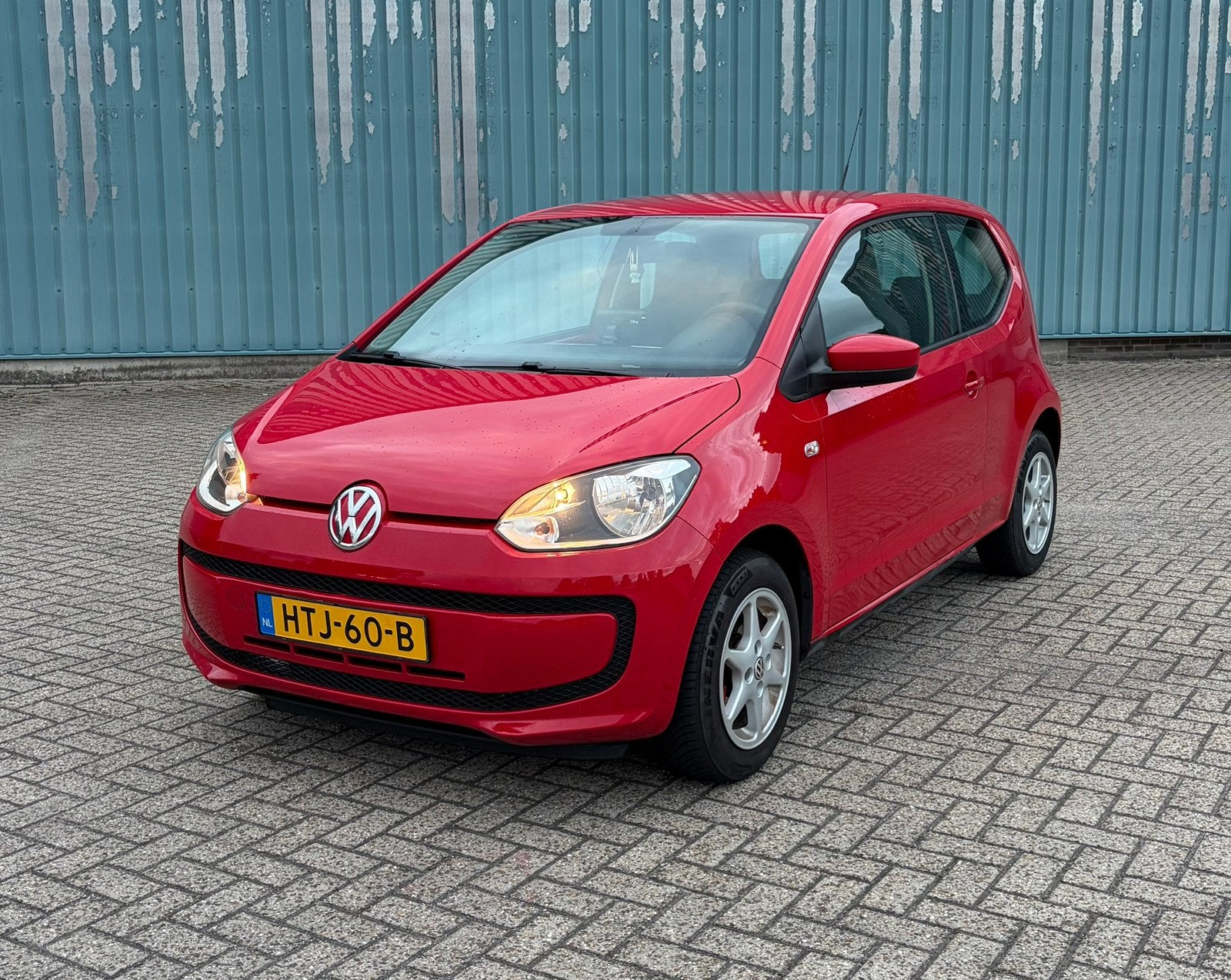 Volkswagen up! 1.0 44KW 2012 Rood, Auto's, Volkswagen, Voorwielaandrijving, Stof, 4 stoelen, Handgeschakeld