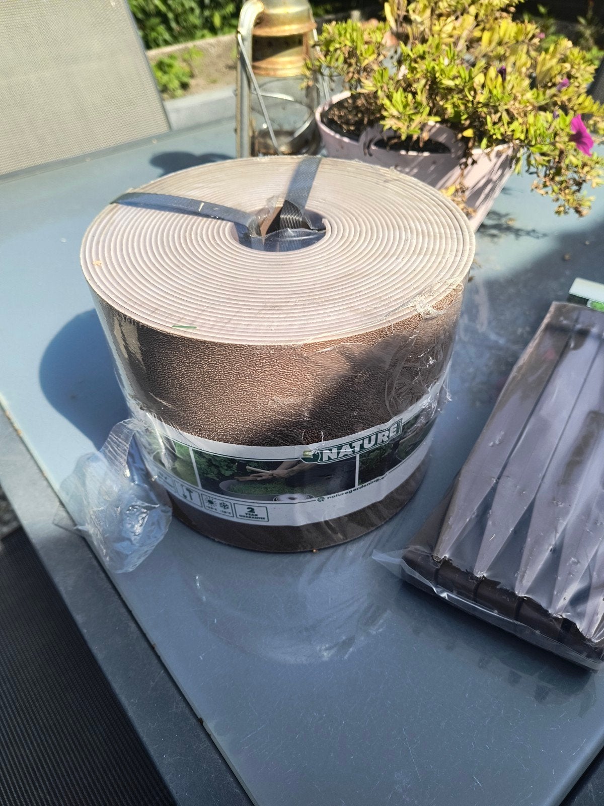 Bruine kunststof border met pinnen - 19m (10m nieuw), Tuin en Terras, Bielzen en Borders, Ophalen, Kunststof, Minder dan 25 cm