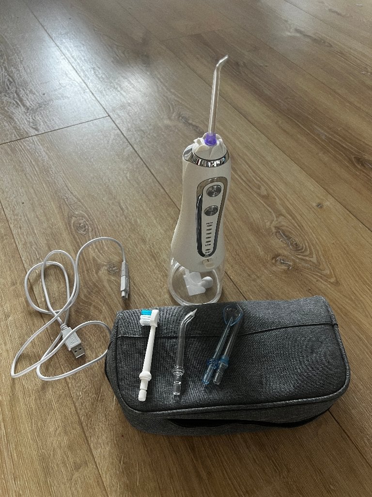 Draagbare monddouche (waterflosser), Ophalen of Verzenden, Zo goed als nieuw, Overige typen