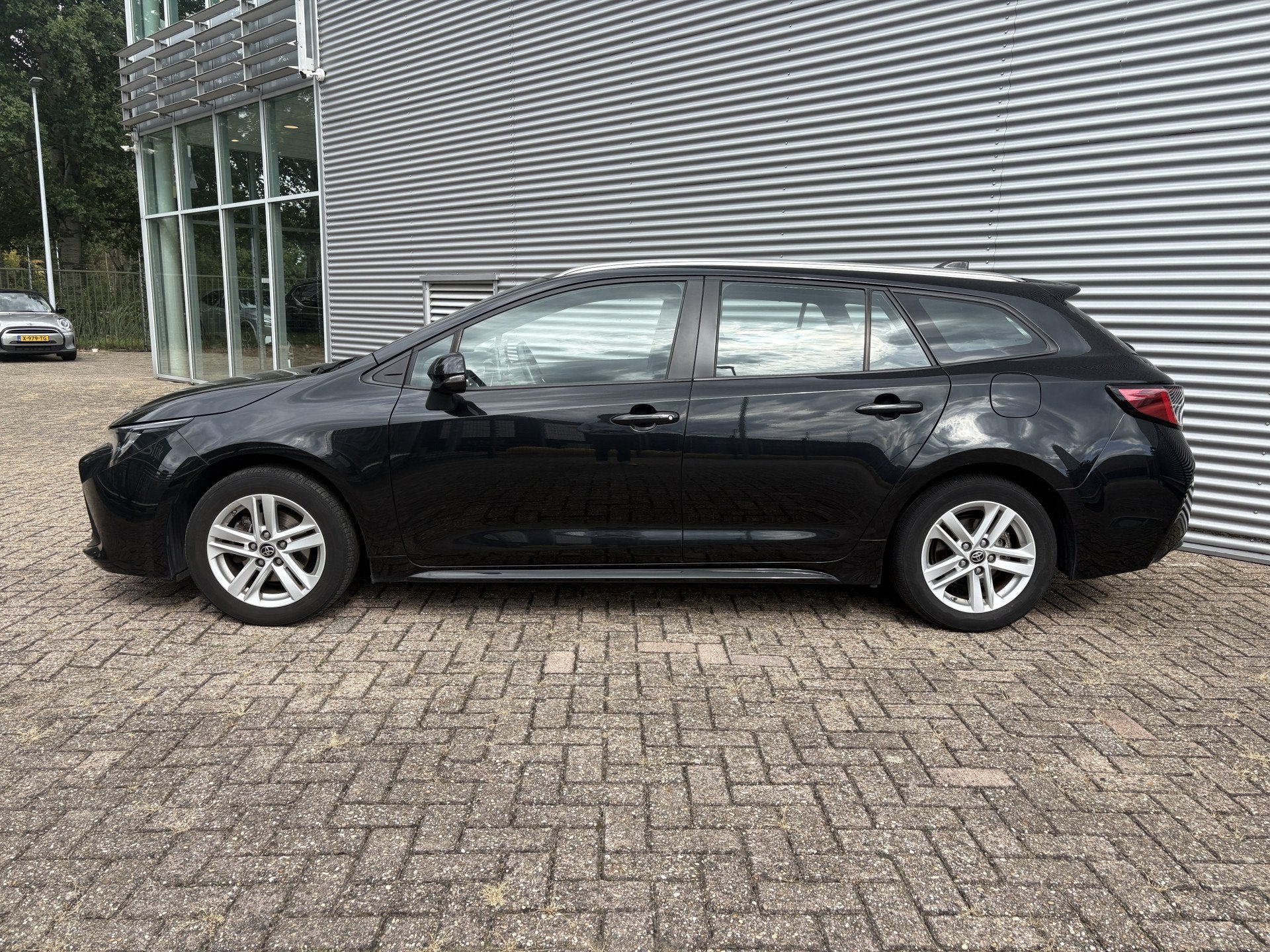 Toyota Corolla Touring Sports 1.8 Hybrid Business | Camera |, Auto's, 4 cilinders, Corolla, Zwart, Origineel Nederlands