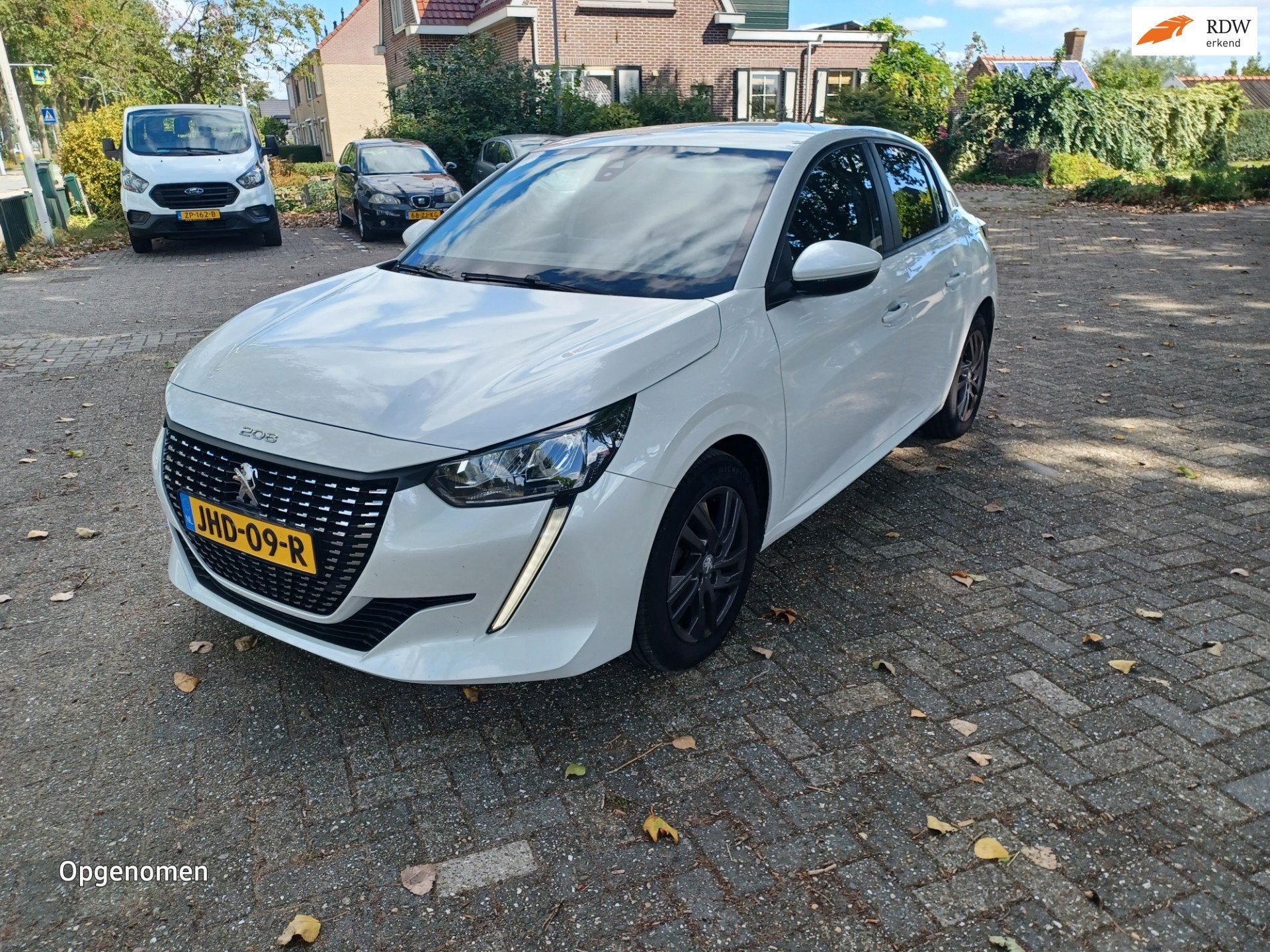 Peugeot 208 1.5 BlueHDi Blue Lease Allure, Auto's, Voorwielaandrijving, Dealer onderhouden, Stof, Gebruikt
