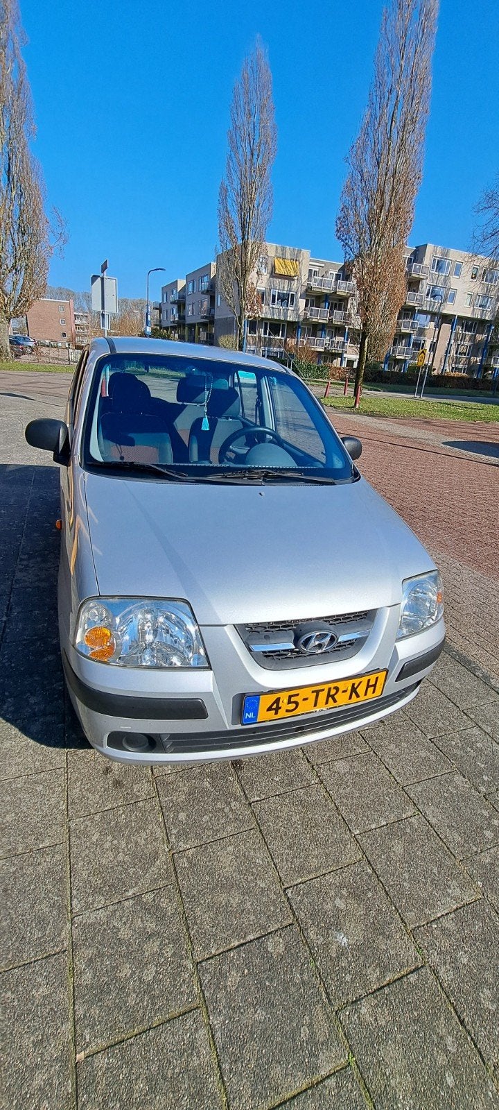 Hyundai Atos 1.1 2007 Grijs, Auto's, Voorwielaandrijving, 31 €/maand, 4 cilinders, Origineel Nederlands