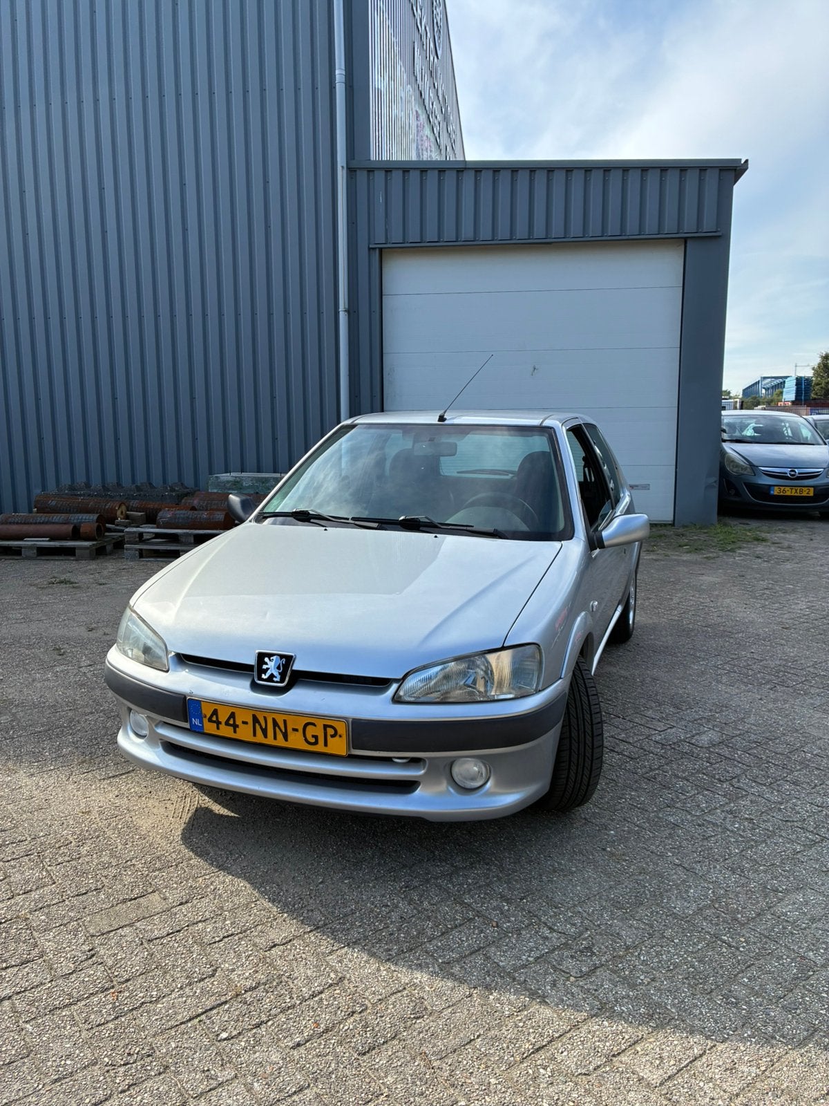 Peugeot 106 1.4 Sport 2004 Grijs, Auto's, Voorwielaandrijving, 4 cilinders, 400 kg, Origineel Nederlands