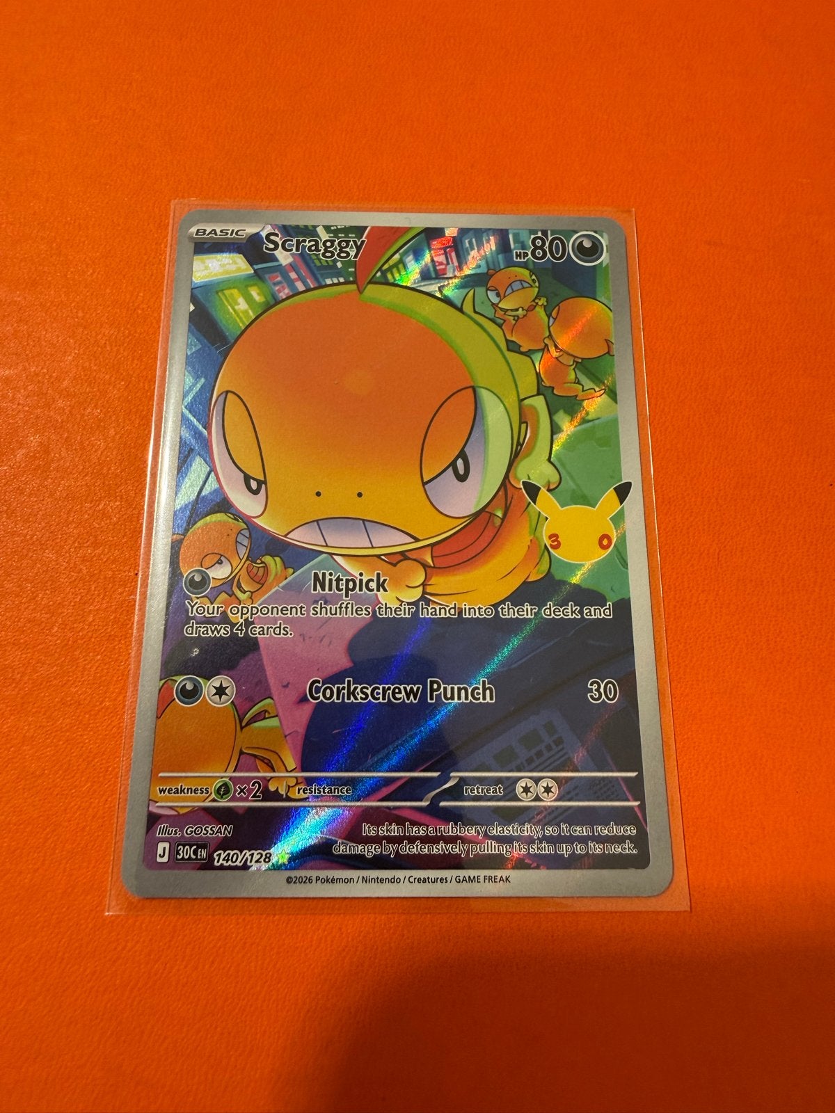 Pokémon Scraggy 140/128 Celebrations Reverse Holo, Ophalen of Verzenden, Zo goed als nieuw, Losse kaart, Foil