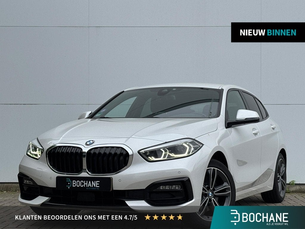BMW 1-serie 118i Business Edition | Sportstoelen | Stuurwiel, Auto's, BMW, 136 pk, Gebruikt, Leder en Stof, Wit