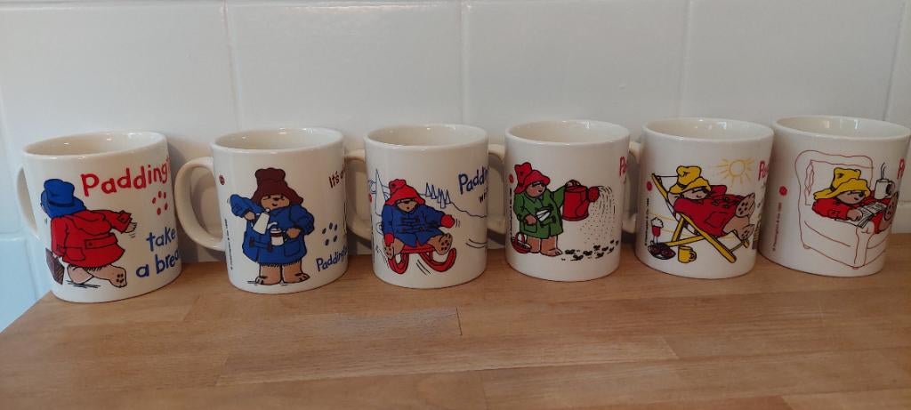 6 verschillende paddington mokken douwe egberts complete set, Nieuw, Ophalen of Verzenden, Wedgwood, Kop(pen) en/of Schotel(s)