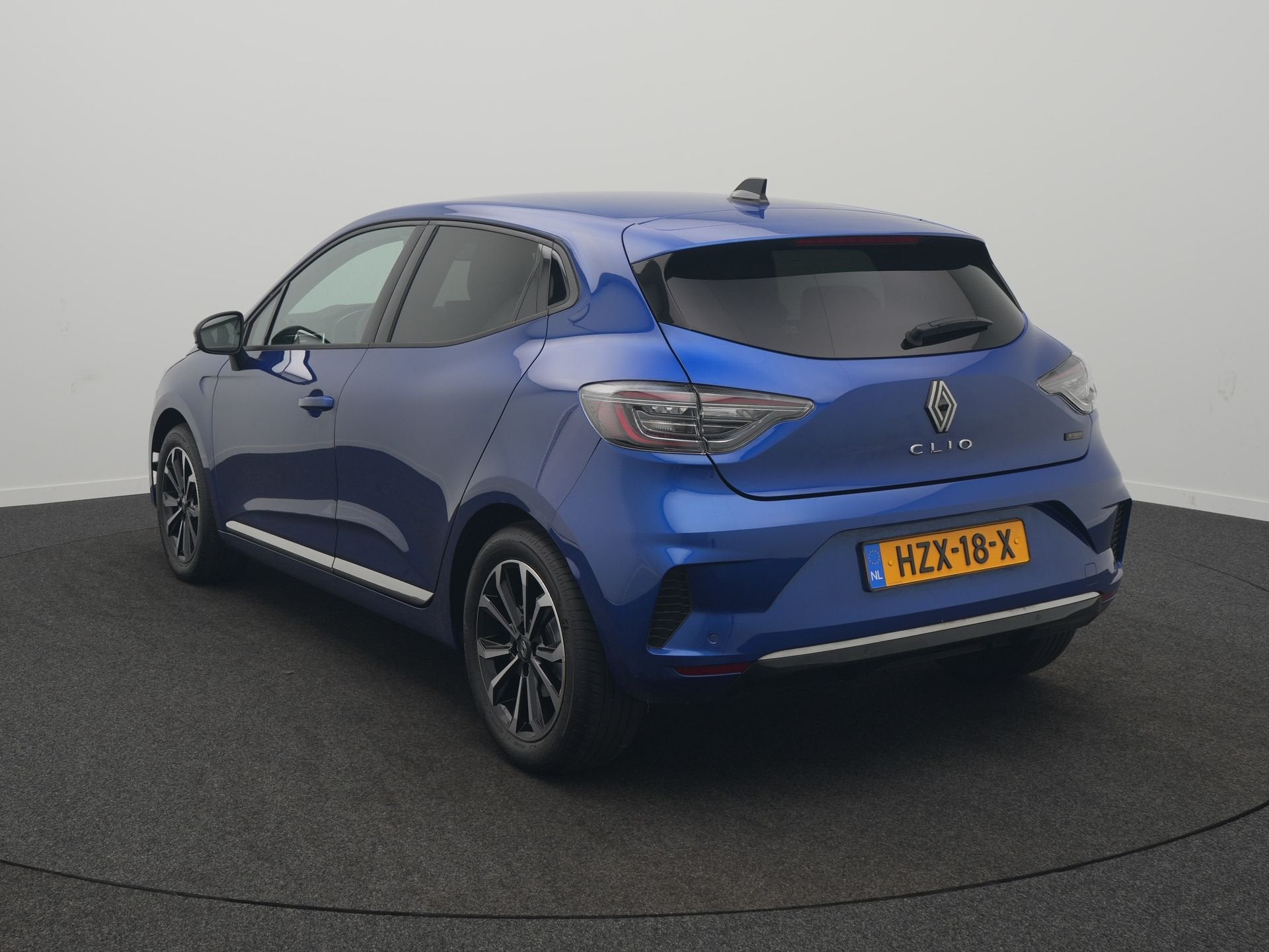 Renault Clio 1.6 E-Tech Full Hybrid 145 techno Pack Look - P, Auto's, Stof, Gebruikt, Blauw, Origineel Nederlands