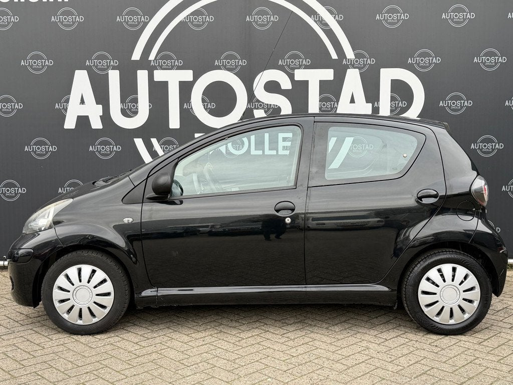 Toyota Aygo 1.0-12V Cool NL-Auto / 1ste Eigenaar / NAP / Air, Auto's, Toyota, Euro 5, Stof, Zwart, 4 stoelen