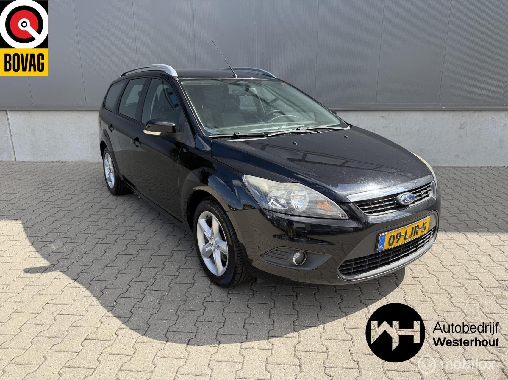 Ford Focus Wagon 1.6 Comfort|AIRCO|BLUETOOTH|TREKHAAK|ONDERH, Auto's, Gebruikt, 4 cilinders, 635 kg, Zwart