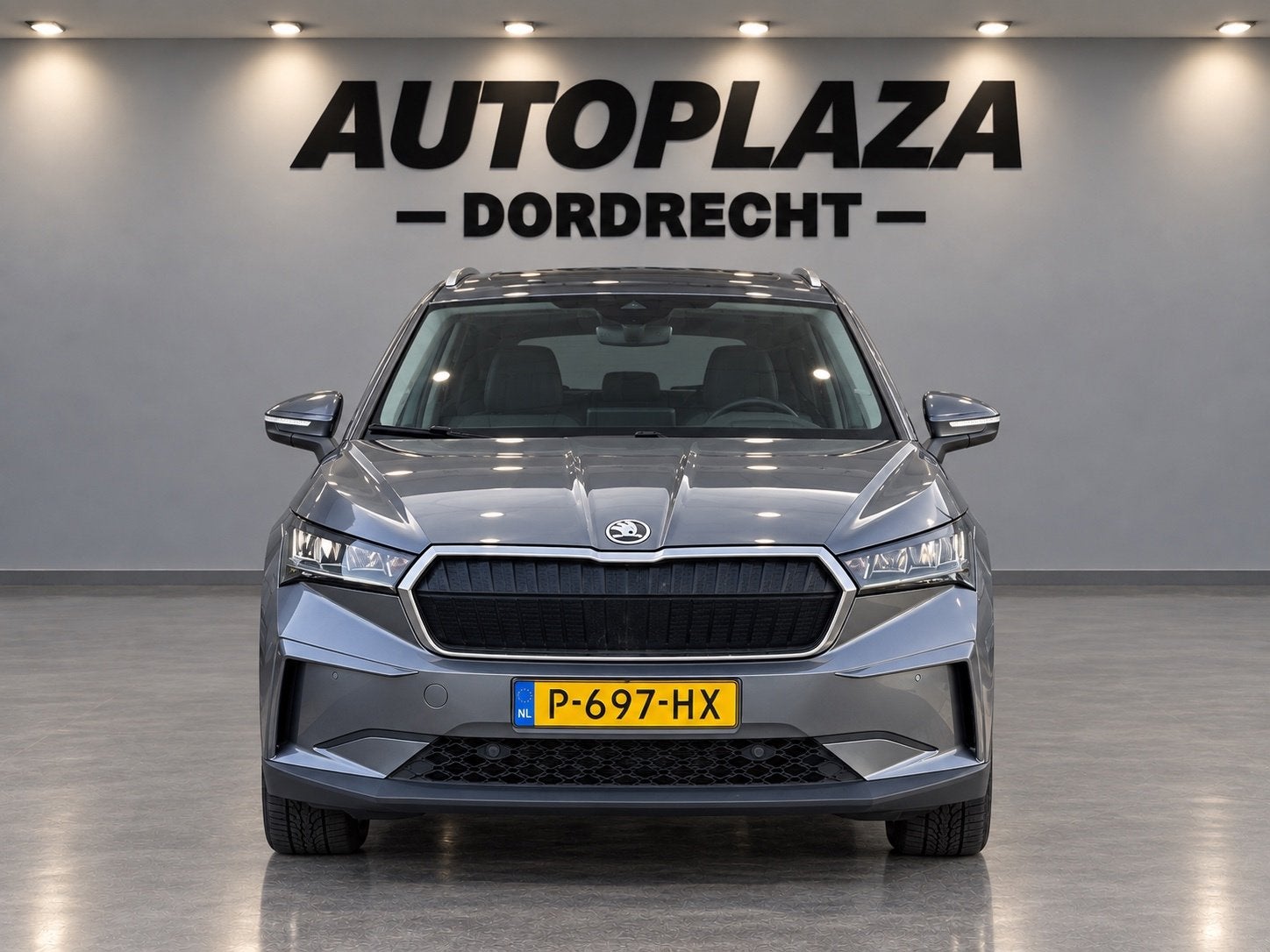 Skoda Enyaq iV 80 SOH 89.4%, Auto's, Dealer onderhouden, Gebruikt, Zwart, Verwarmde buitenspiegels