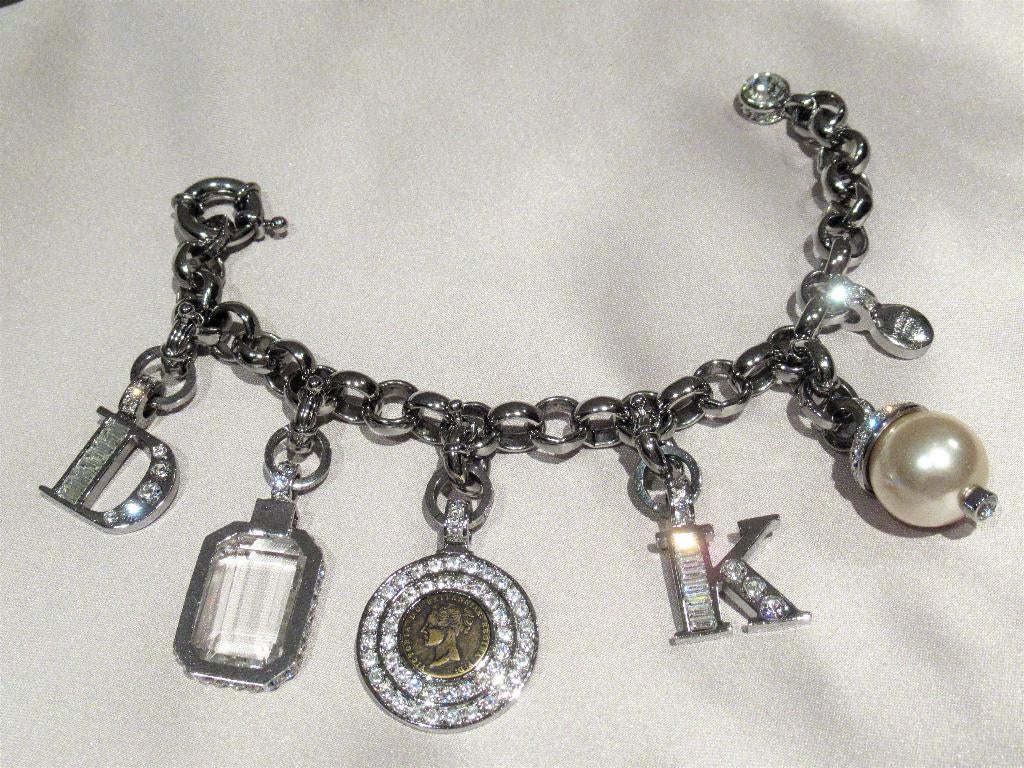 Dyrberg/Kern bedelarmband met kristallen, Sieraden, Tassen en Uiterlijk, Armbanden, Overige materialen, Verzenden, Met bedels of kralen