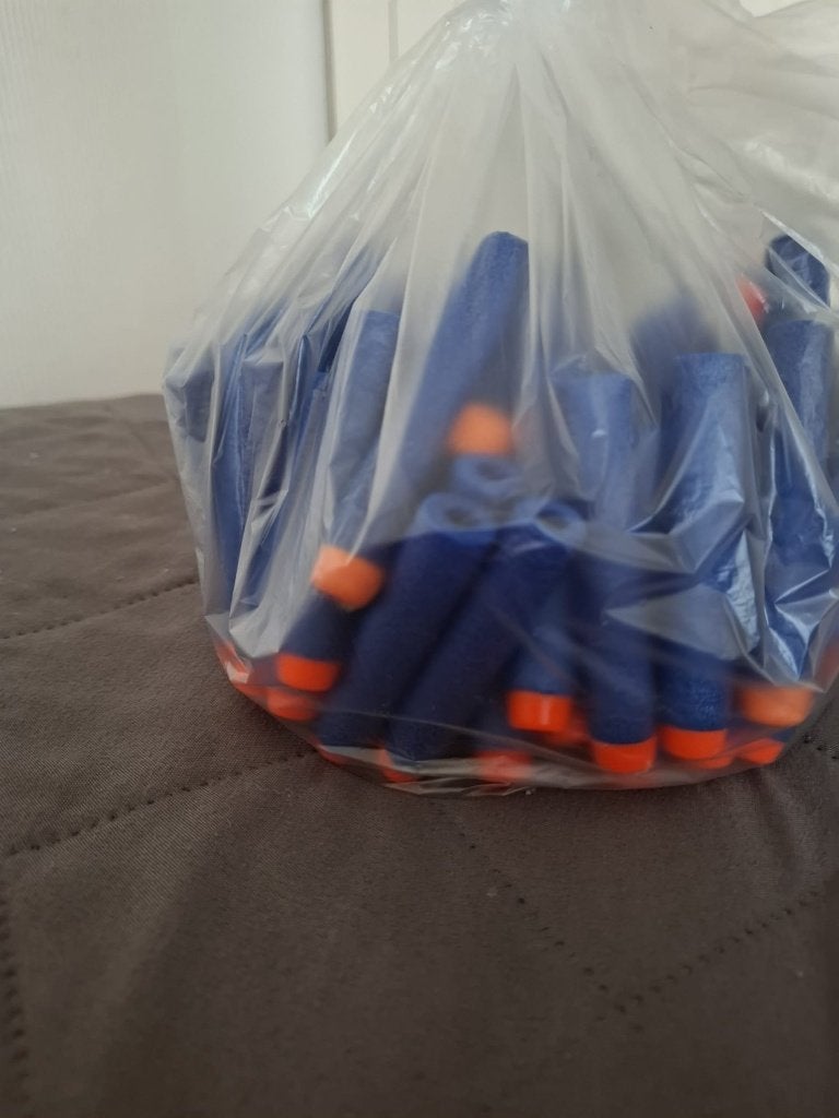 Zak met nerfpijltjes, Ophalen