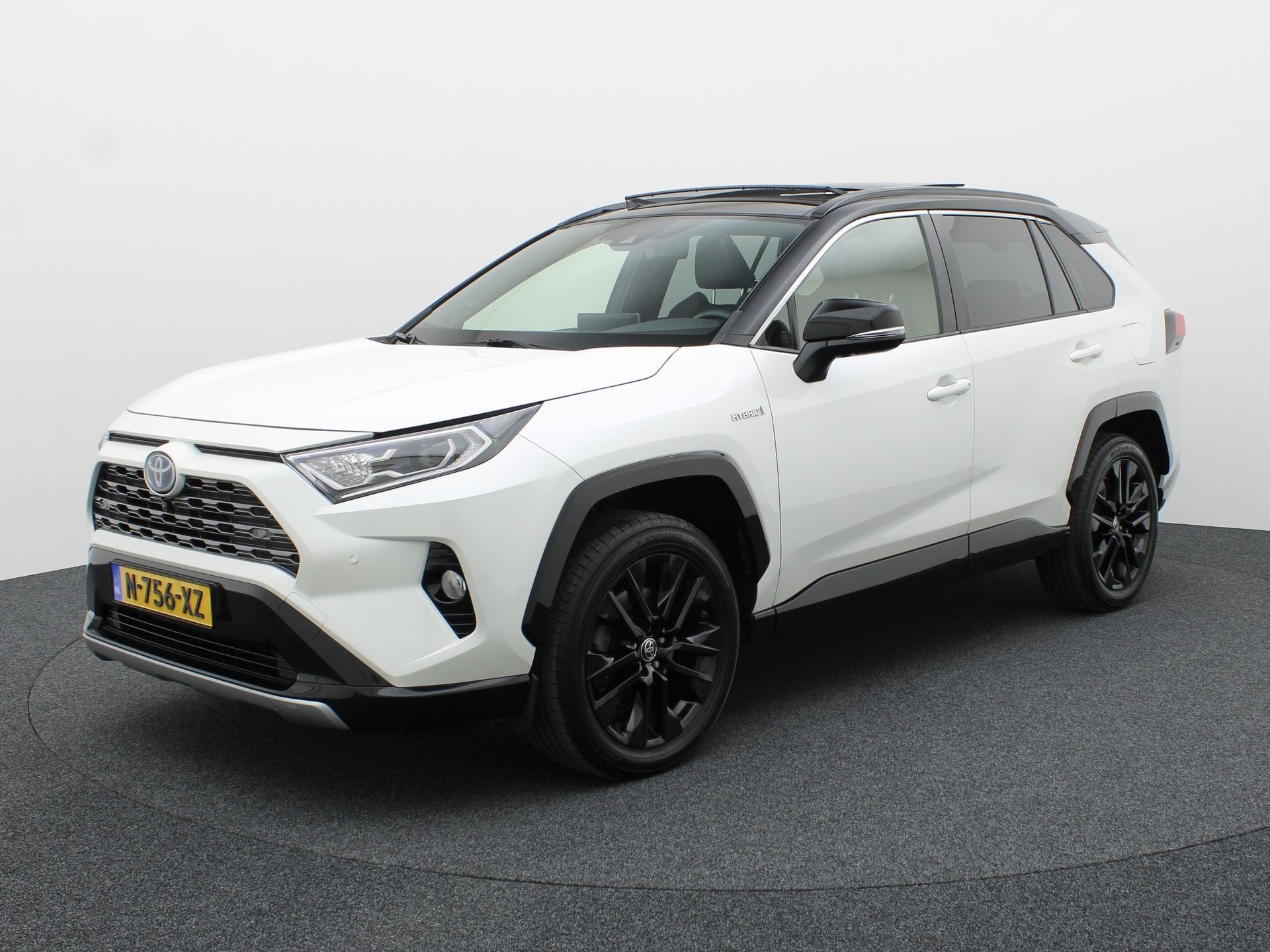 Toyota RAV4 2.5 Hybrid Bi-Tone | NL Auto | Panodak | Elek. S, Auto's, 12 maanden, Gebruikt, 4 cilinders, Overige brandstoffen