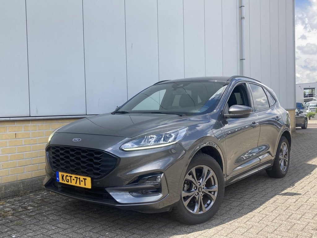 Ford Kuga 2.5 PHEV ST-Line AGR stoelen elektrisch verstelbaa, Auto's, Ford, 14 kWh, Gebruikt, 4 cilinders, Leder en Stof