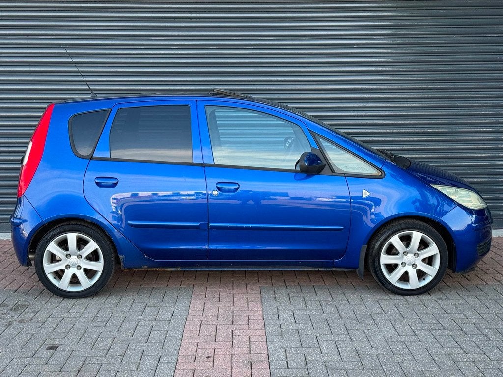 Mitsubishi Colt 1.5 d'Azur Parkeersensor | Panoramadak | Air, Auto's, Mitsubishi, Voorwielaandrijving, Stof, 4 cilinders, Blauw