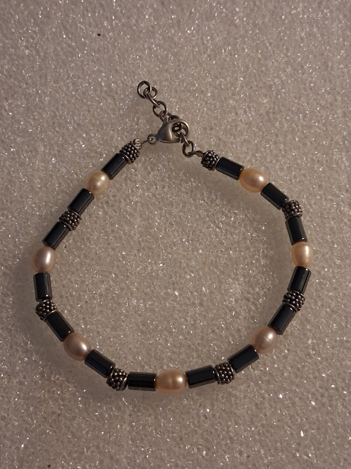 Armband Parel/Haematiet met zilver tussenstukjes, Ophalen of Verzenden, Nieuw, Wit, Overige materialen
