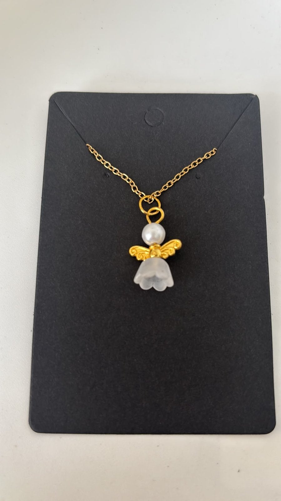 Nieuwe Goudkleurige Ketting met Engel Hanger, Nieuw, Ophalen of Verzenden, Goud, Overige materialen