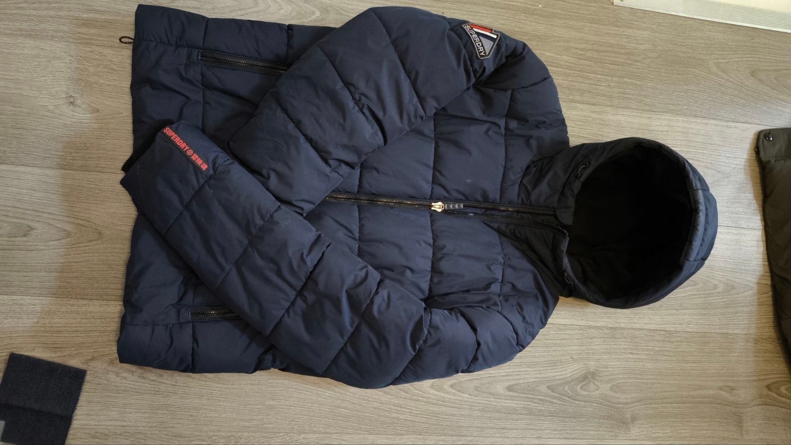 Superdry winterjas maat L, Maat 52/54 (L), Blauw, Ophalen of Verzenden, Gedragen