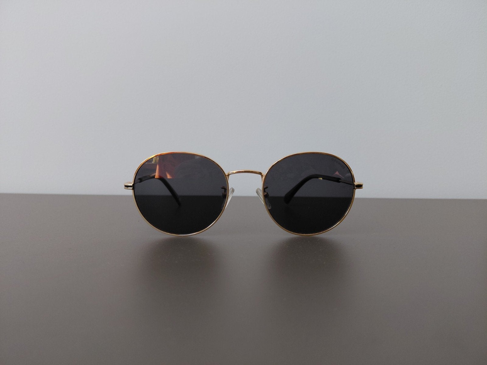 Polaroid Zonnebril - zeer goede staat, Sieraden, Tassen en Uiterlijk, Overige merken, Zonnebril, Zwart, Ophalen of Verzenden