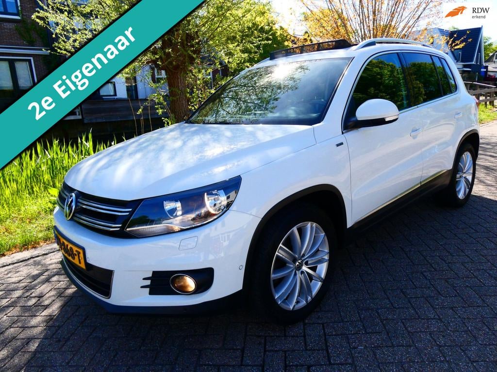 Volkswagen Tiguan 1.4 TSI R-Line 122pk 2e eig. Clima Navi PD, Voorwielaandrijving, Euro 5, Gebruikt, Handgeschakeld