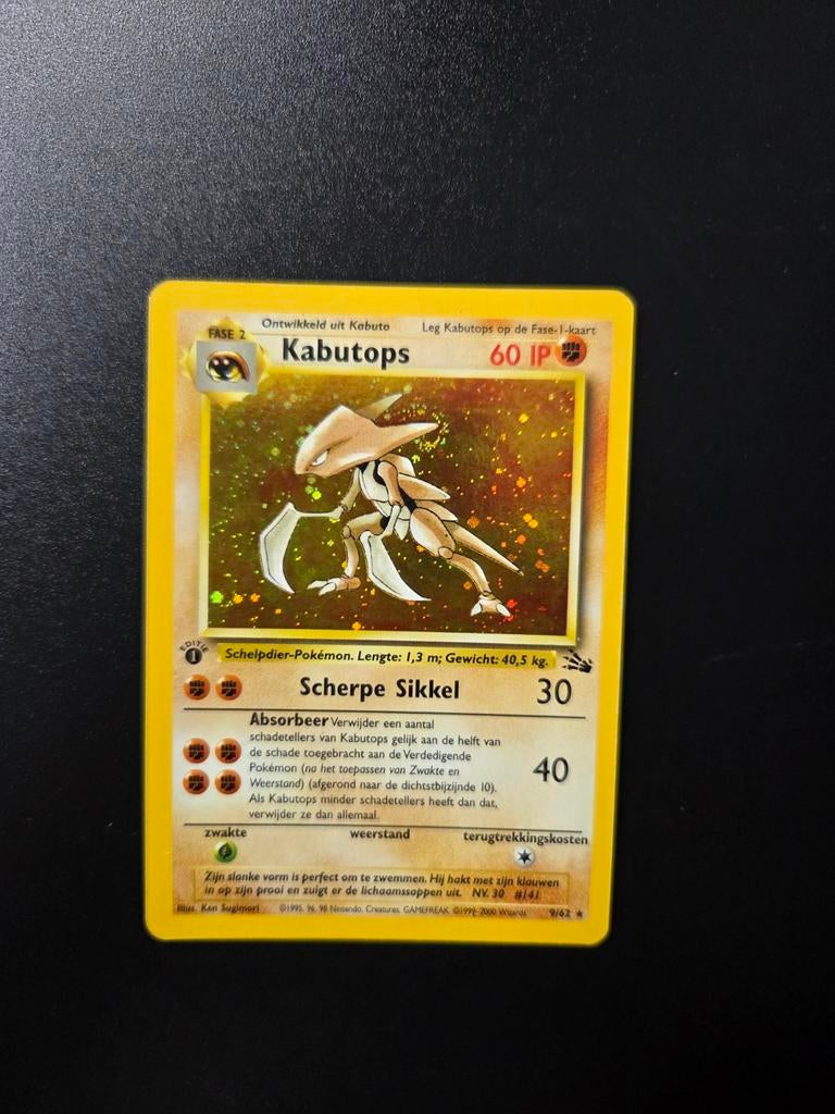 Kabutops 9/62 Pokemon Fossil holo NL swirl, Ophalen of Verzenden, Zo goed als nieuw, Booster, Foil