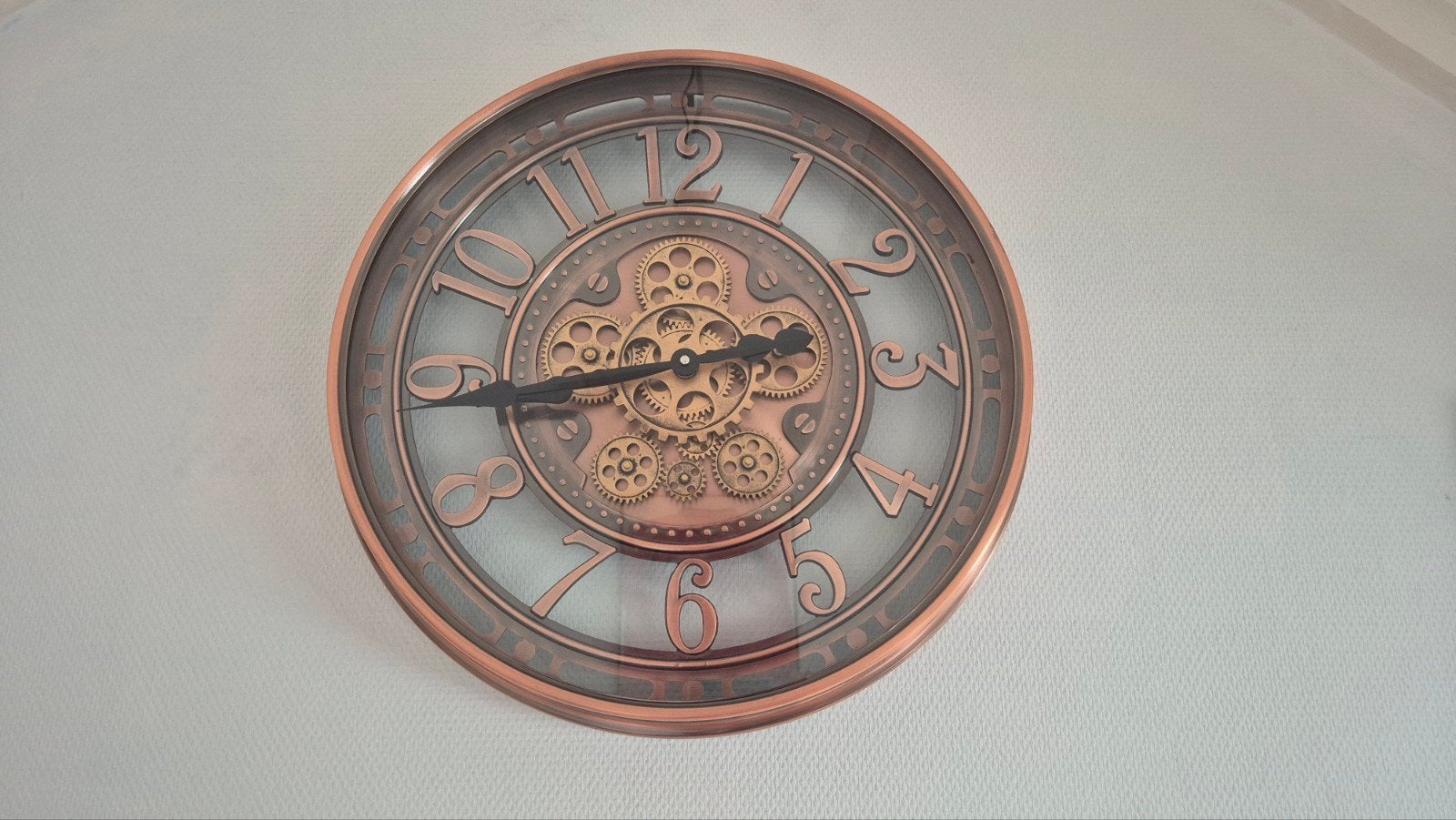 Industriële wandklok met bewegende tandwielen – koper/brons, Ophalen of Verzenden, Wandklok