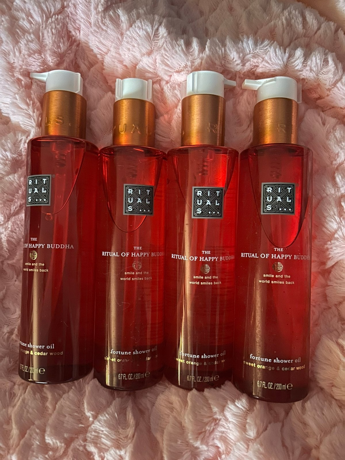 Happy Buddha showeroil 4 stuks, Ophalen of Verzenden, Nieuw, Bodylotion, Crème of Olie