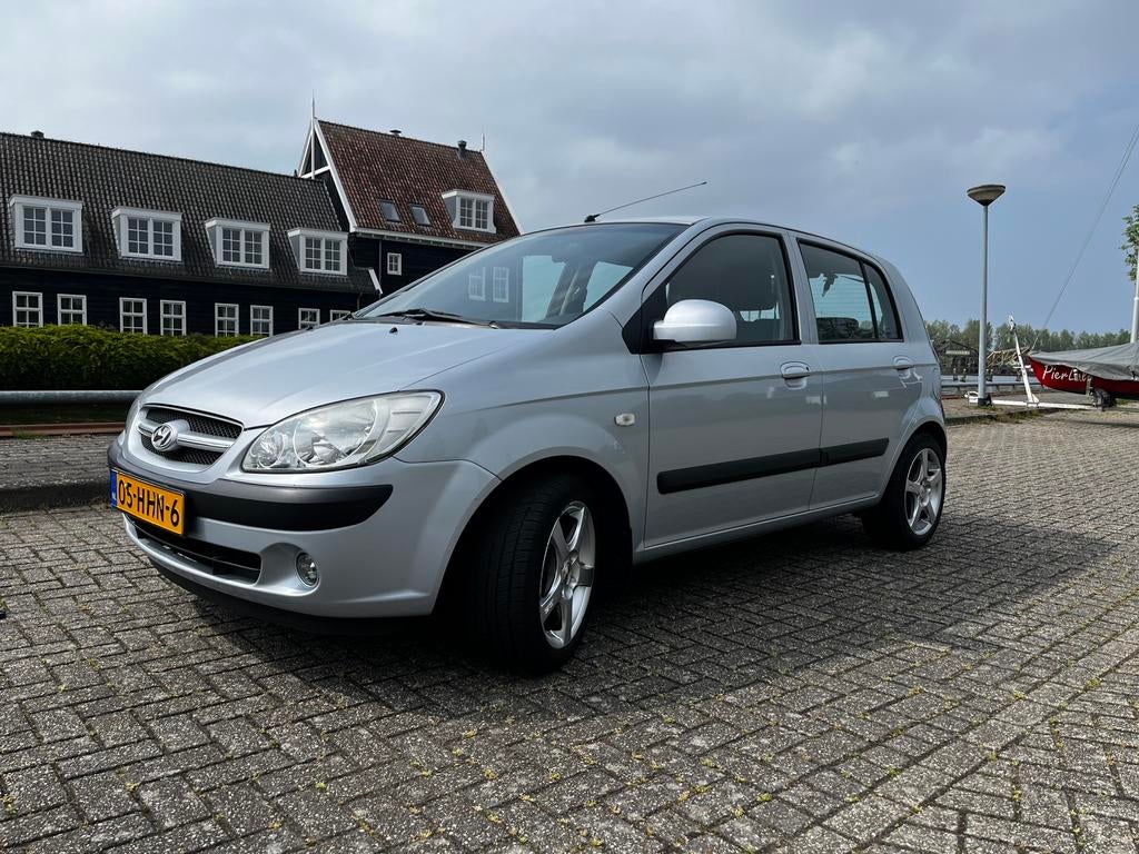 Hyundai Getz 1.4 5DRS 2008 Grijs, Auto's, Voorwielaandrijving, 40 €/maand, Zwart, Origineel Nederlands