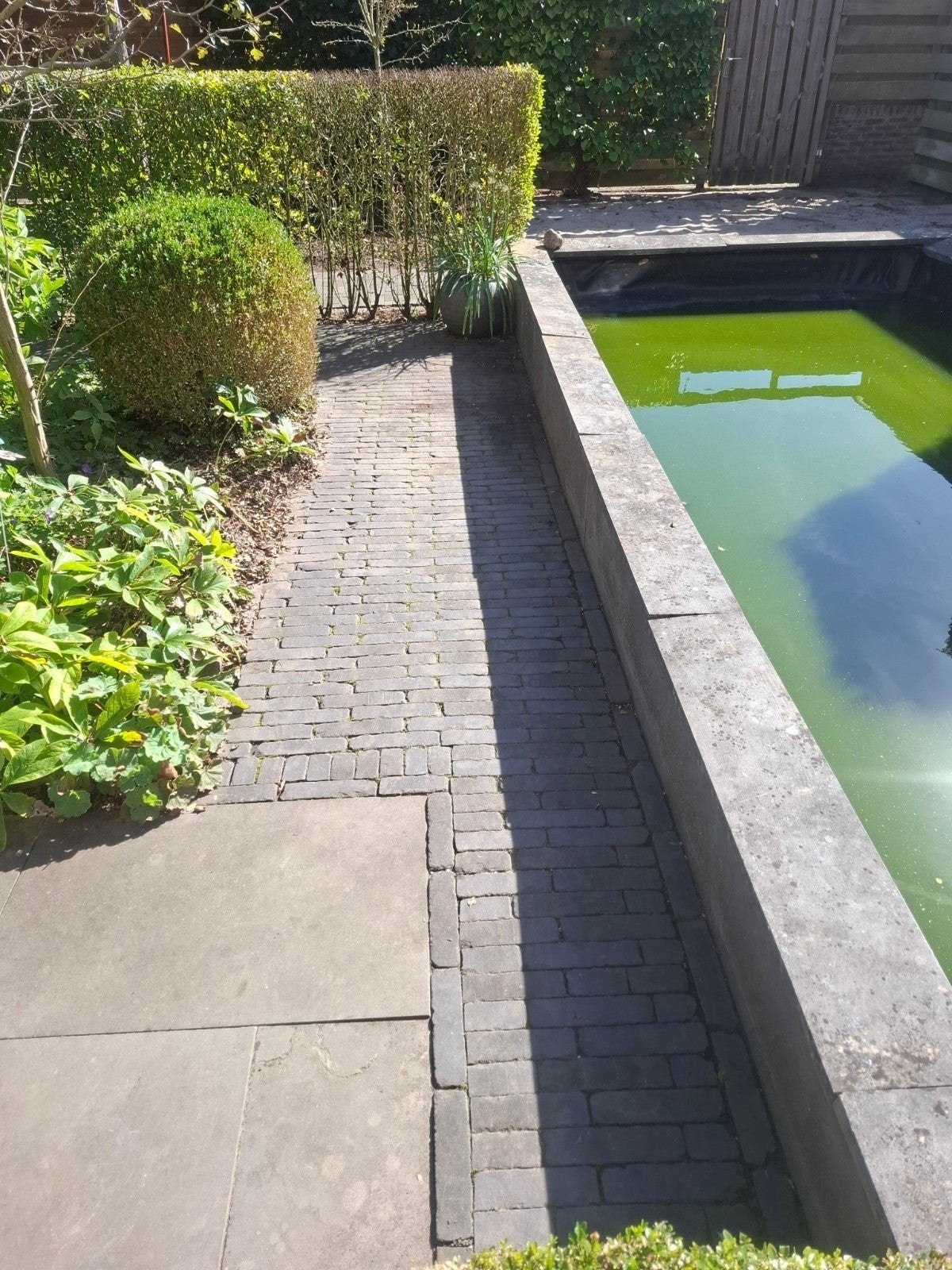 Getrommelde waaltjes 25 m2 Onyx Black, Ophalen, Gebruikt, Klinkers, 10 m² of meer