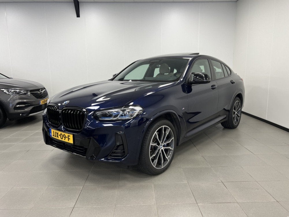 BMW X4 M40i 360PK / M-SPORT HIGH EXE / PANODAK / 360 CAMERA, Automaat, 12 maanden, Gebruikt, Blauw