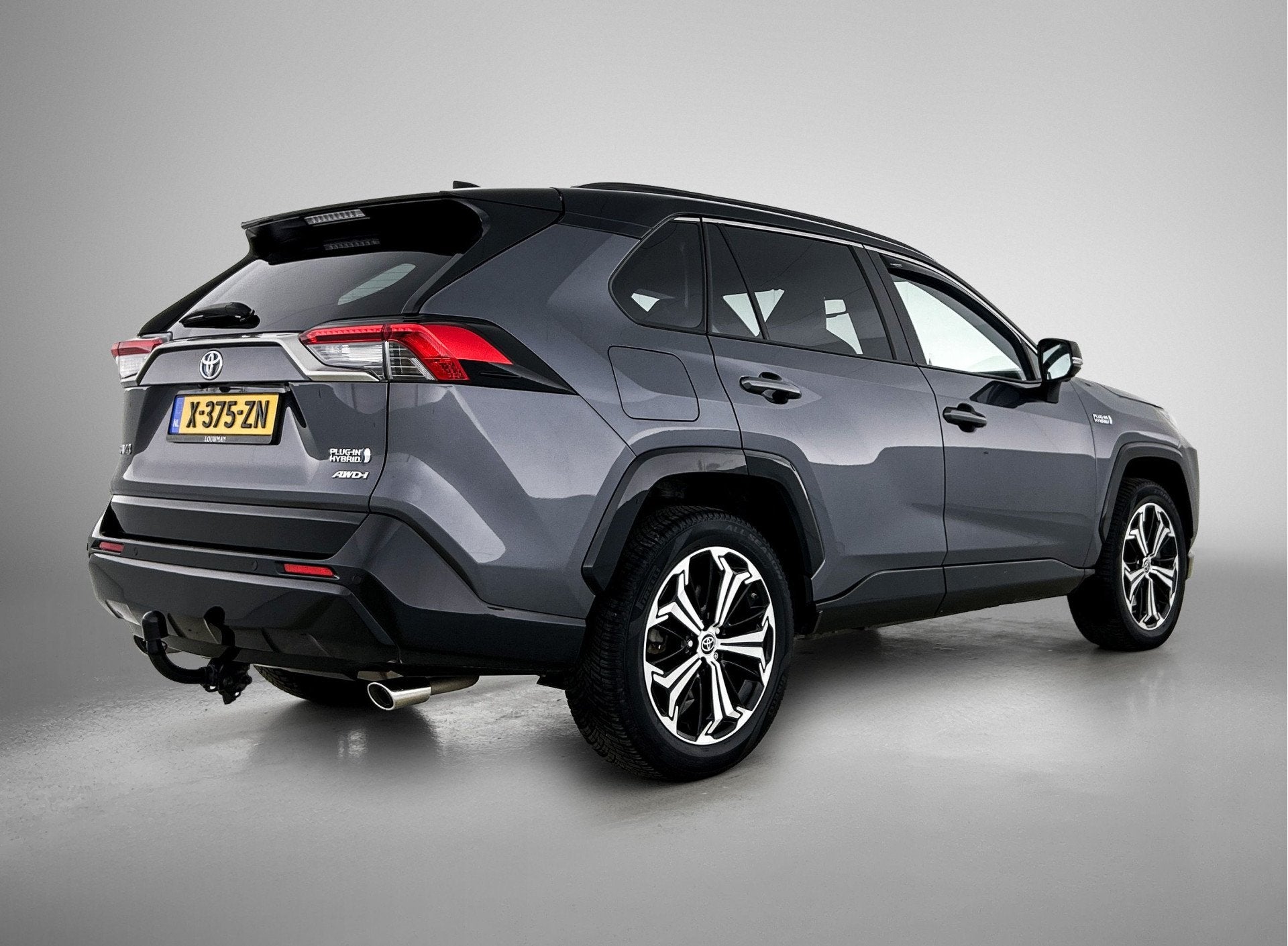 Toyota RAV4 2.5 Plug-in Hybrid AWD Bi-Tone Plus | NL dealero, Automaat, Stof, Gebruikt, 4 cilinders