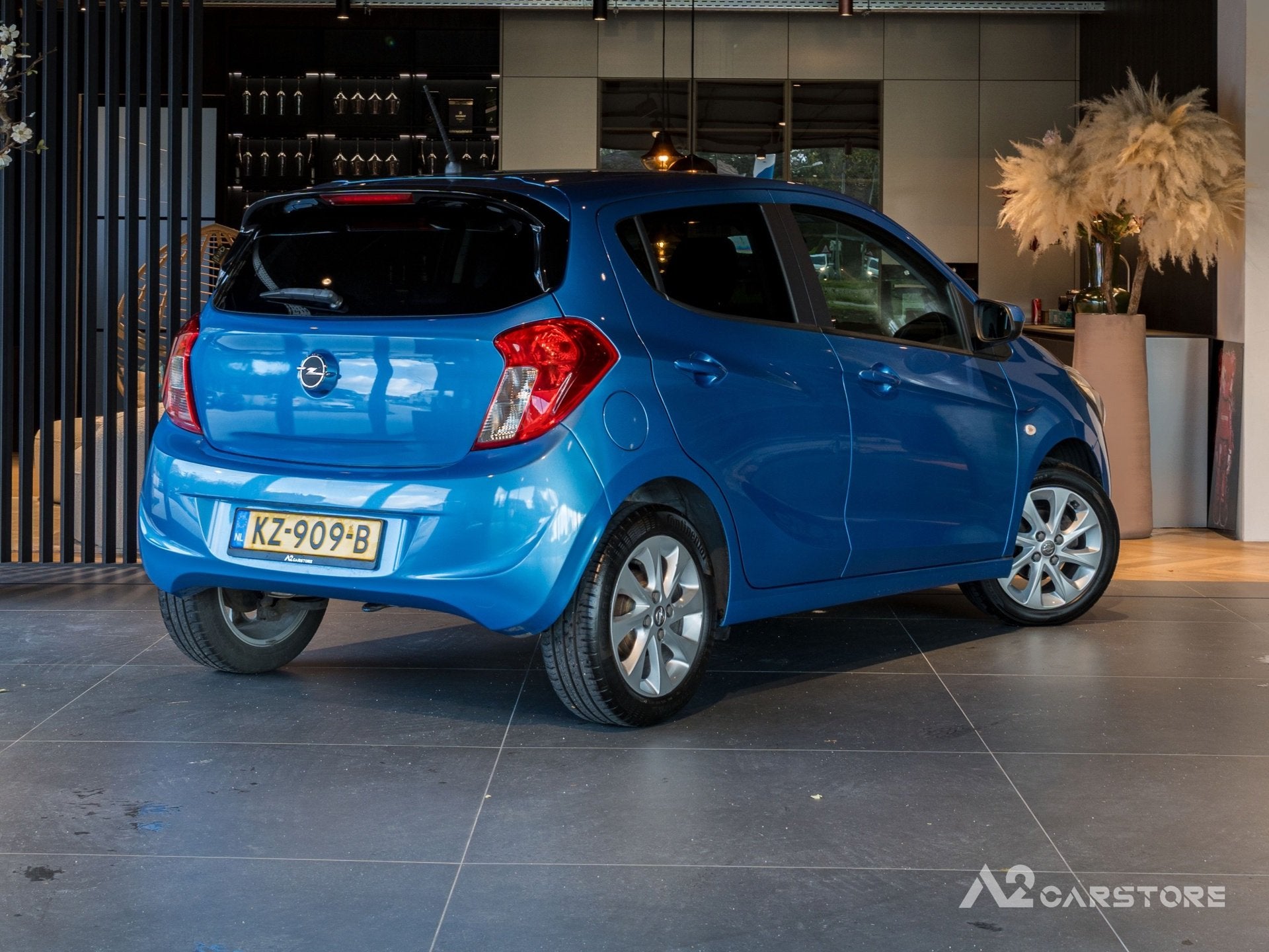 Opel KARL 1.0 ecoFLEX Innovation AUTOMAAT NAP APK AIRCO, Auto's, Gebruikt, Blauw, Verwarmde buitenspiegels, 23 km/l