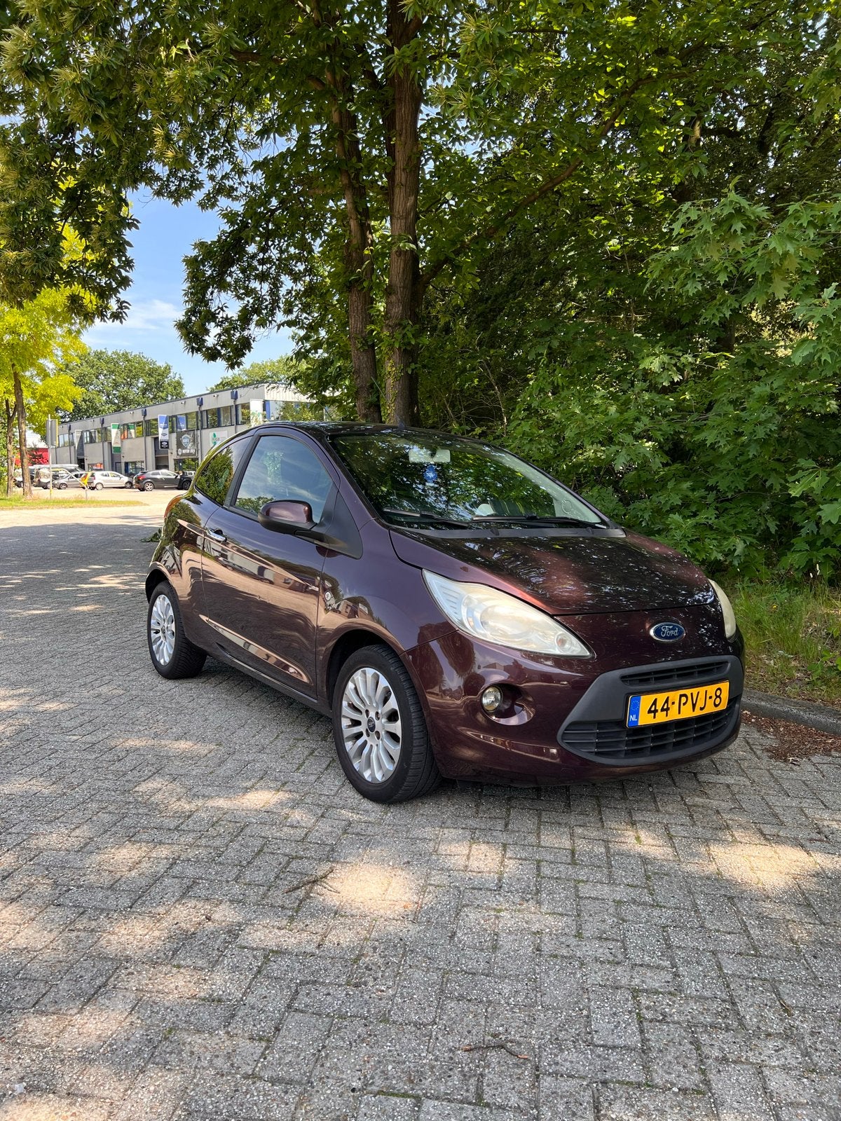 Ford Ka 1.2 69pk 2011 Titanium X Burgundy Start/Stop Airco, Auto's, Ford, Voorwielaandrijving, 1242 cc, 4 cilinders, 4 stoelen