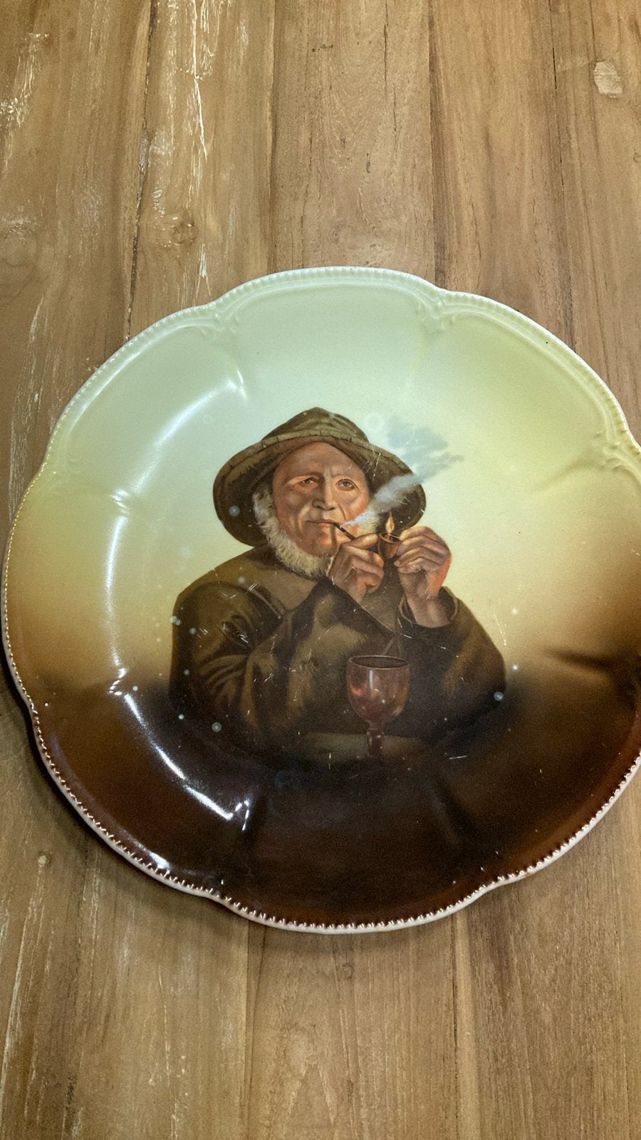 Vintage decoratief bord met pijprokende man, Antiek en Kunst, Ophalen