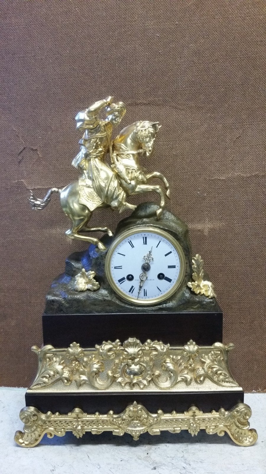 bronzen pendule, Ophalen