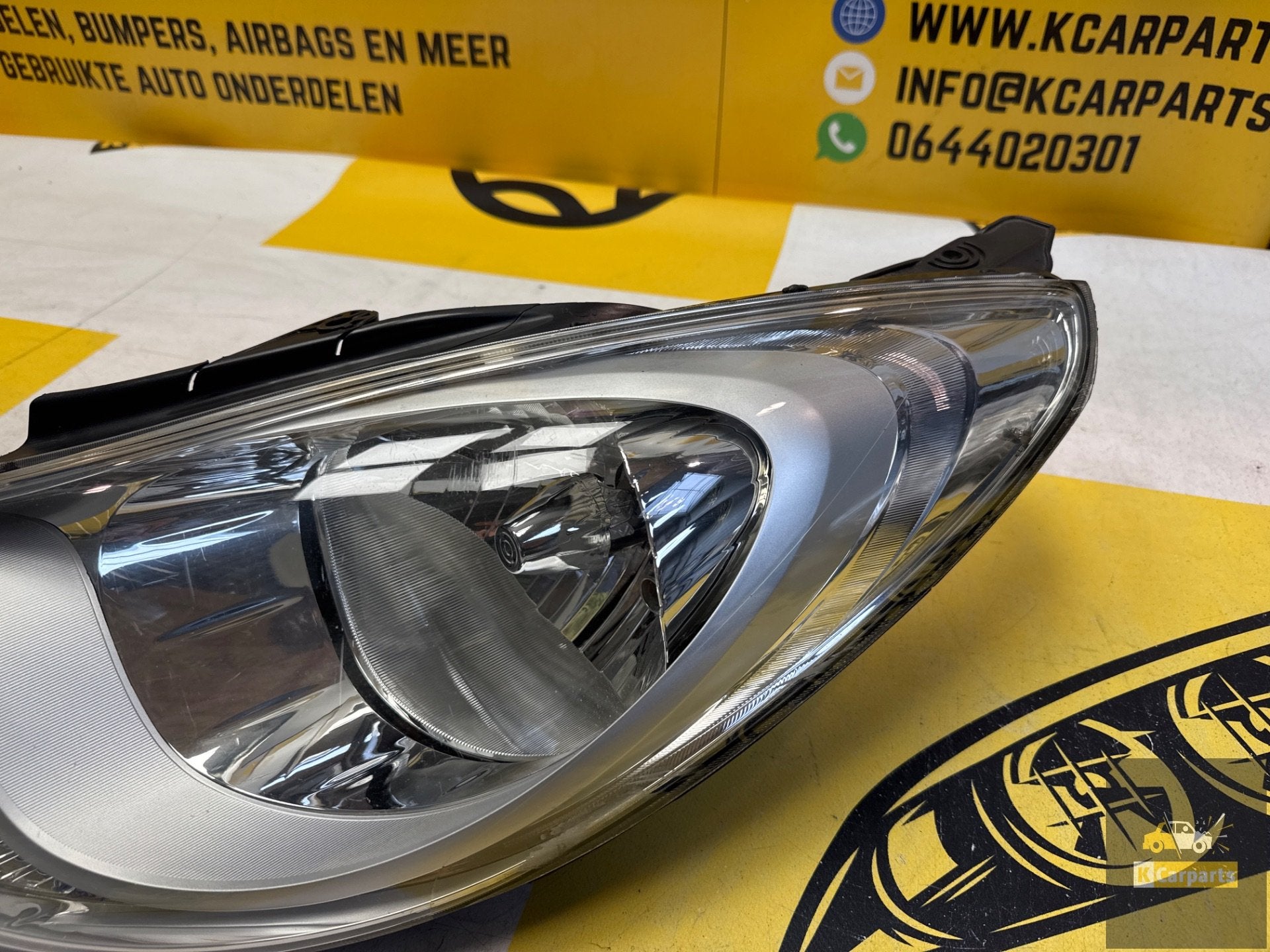 Hyundai i10 links voor koplamp origineel LHD13002 koplamp, Info@fabrikant.eu, Fabrikantstraat 1
1000 AA  Amsterdam, NL, Ophalen of Verzenden