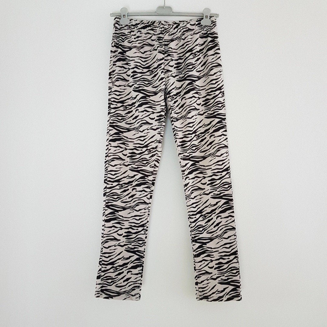 Zebra print broek maat 42, Ophalen of Verzenden, Zo goed als nieuw, Maat 42/44 (L), Zwart
