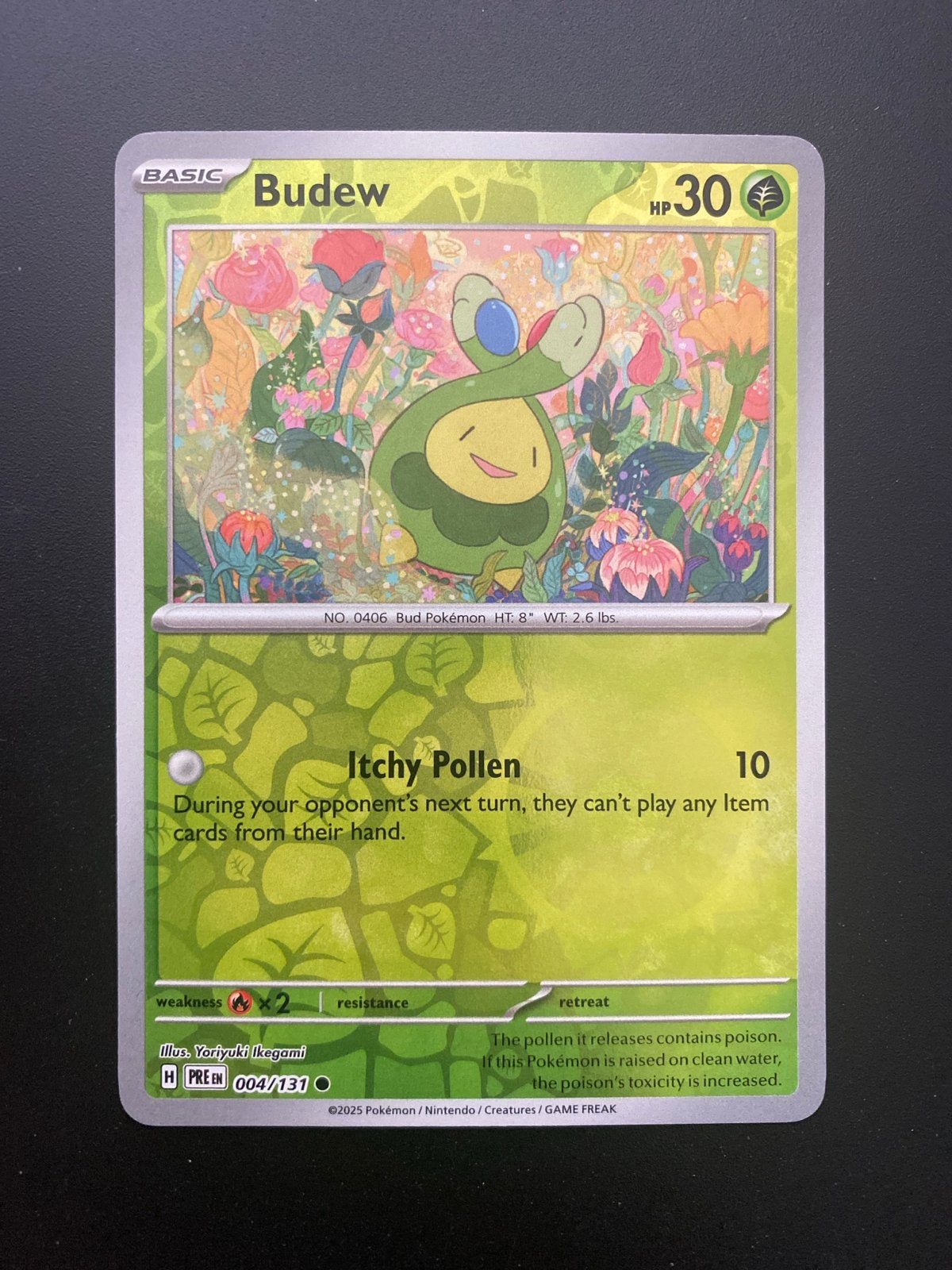 Budew 004/131 Reverse Holo Prismatic Evolutions, Ophalen of Verzenden, Zo goed als nieuw, Losse kaart, Foil