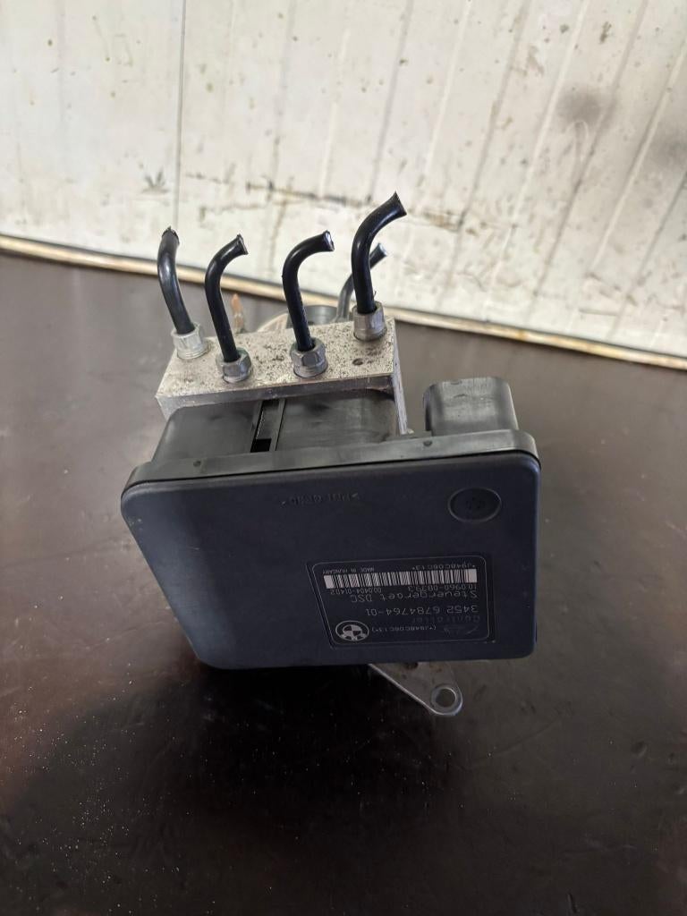 ABS, DSC pomp BMW 1-serie,3-serie E90,E91,E87,3452678476401, Auto-onderdelen, Remmen en Aandrijving, BMW, Gebruikt, Ophalen of Verzenden
