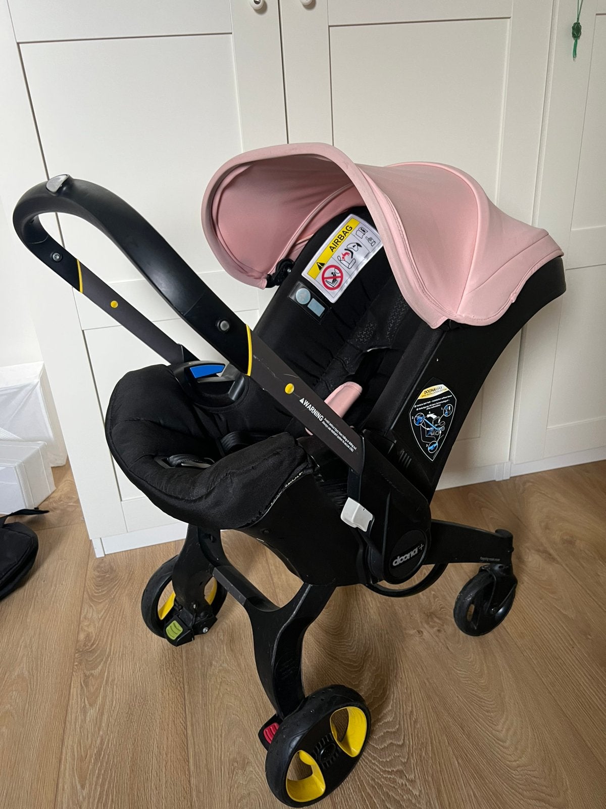 Doona autostoel/kinderwagen 2-in-1 + ISOFIX base – roze, Ophalen, Zo goed als nieuw, Overige merken