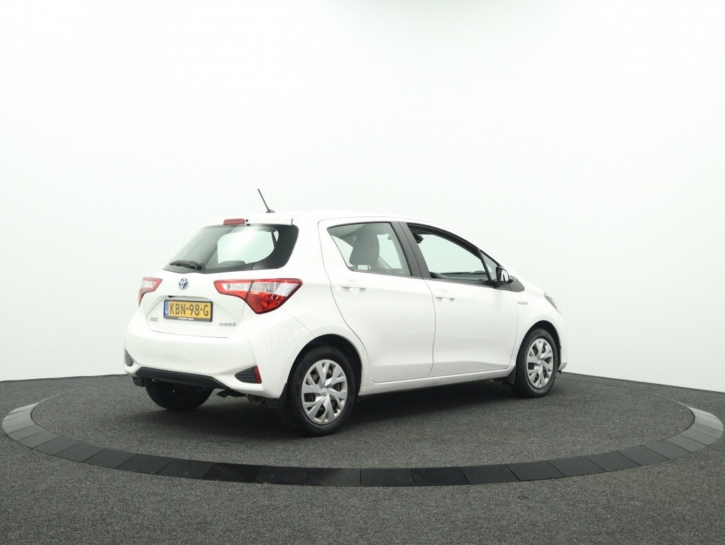 Toyota Yaris 1.5 Hybrid Active | Navigatie | Camera | Cruise, Auto's, Automaat, 12 maanden, Gebruikt, Euro 6