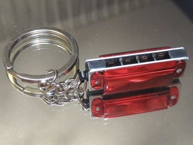 sl. sleutelhanger HARMONICA - 3 verschillende kleuren, Verzenden, Nieuw, Overige typen