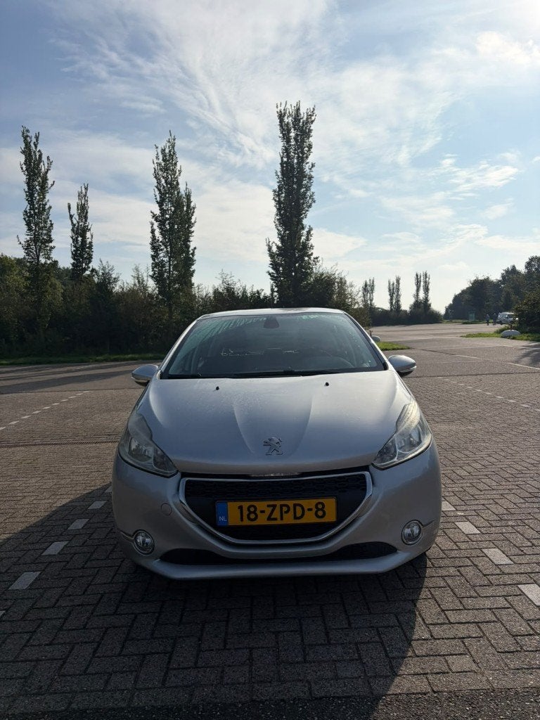 Foto 7 van Peugeot 208 1.2 VTi 82PK 5D 2013 - Grijs / Zilver