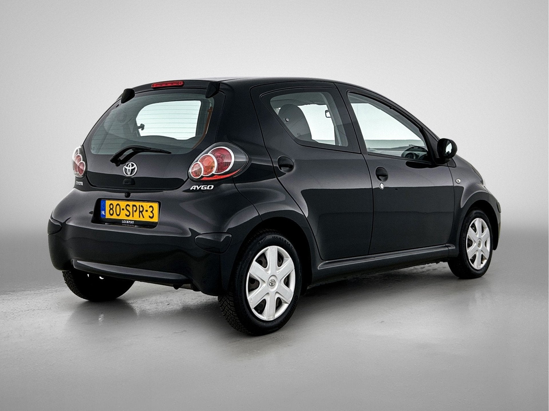 Toyota Aygo 1.0-12V Now | Eelektrische ramen | Airco |, Voorwielaandrijving, Stof, Gebruikt, Zwart