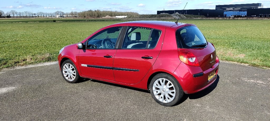 Renault Clio 1.2 16V 55KW 5-DRS E4 2009 Rood Nieuwe APK, Auto's, Voorwielaandrijving, 74 pk, Zwart, 4 cilinders