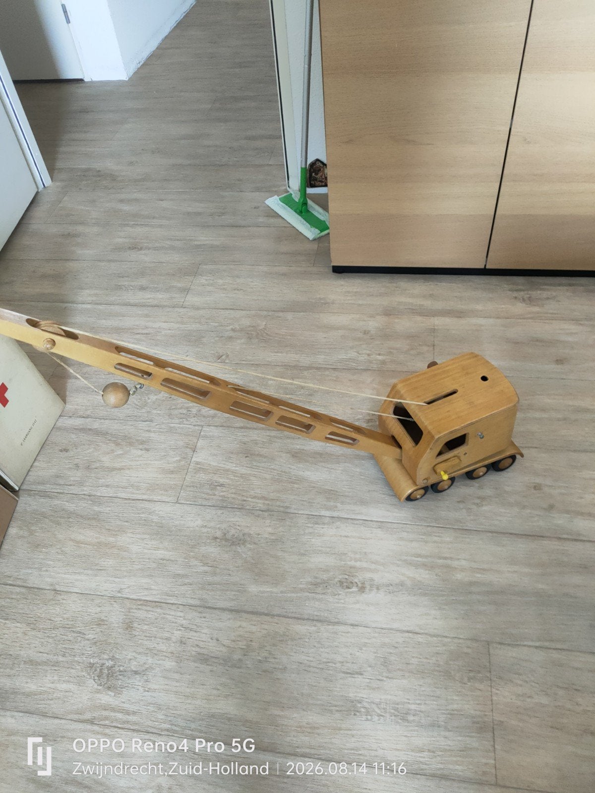 houten hijskraan, Ophalen, Zo goed als nieuw