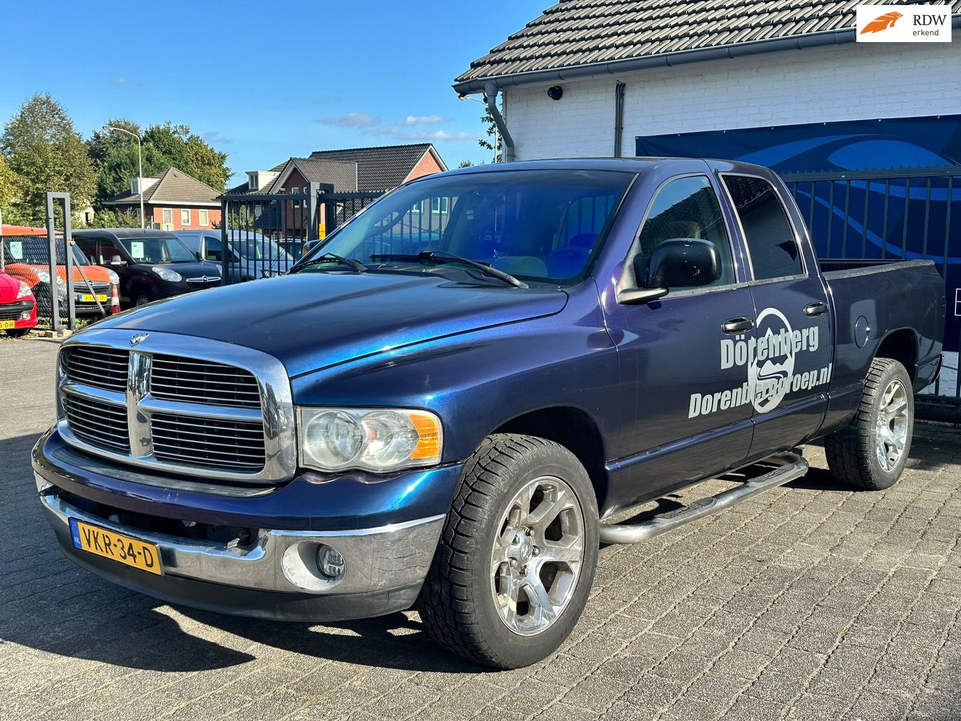 Dodge DODGE RAM 1500 / BENZINE - LPG / TREKHAAK / AIRCO / NA, Auto's, Gebruikt, 8 cilinders, Navigatiesysteem, Blauw