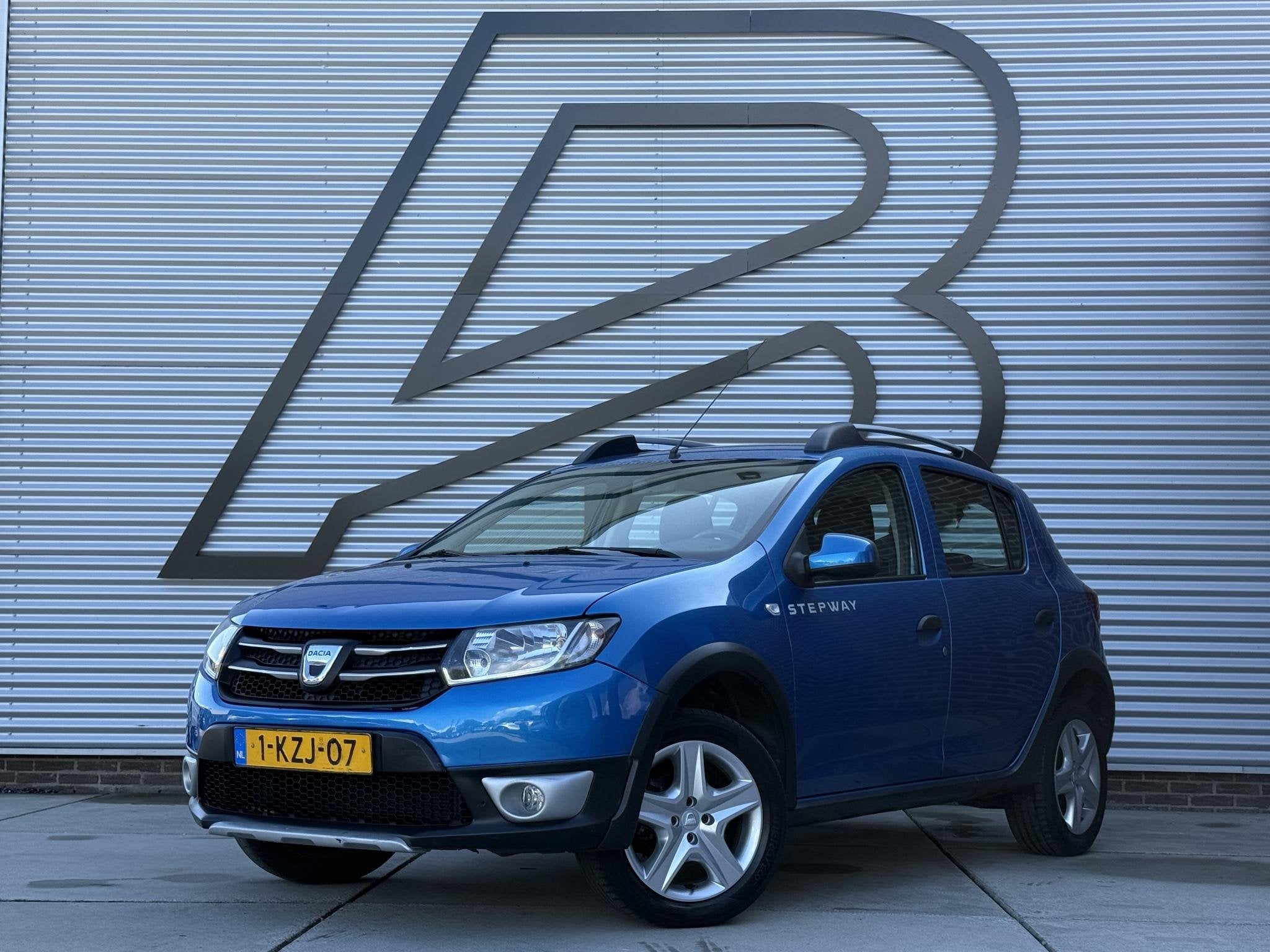 Dacia Sandero 0.9 TCe Stepway Lauréate Navi|Airco|Cruise|PD, Auto's, Voorwielaandrijving, Stof, Blauw, Origineel Nederlands