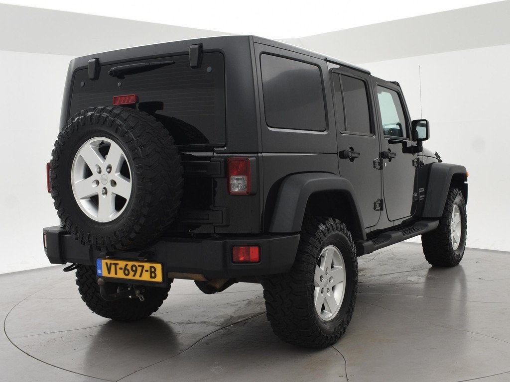 Jeep Wrangler 2.8 CRD 200 PK SPORT AUT. 4X4 GRIJS KENTEKEN *, Auto's, Jeep, Automaat, Euro 5, Stof, Zwart